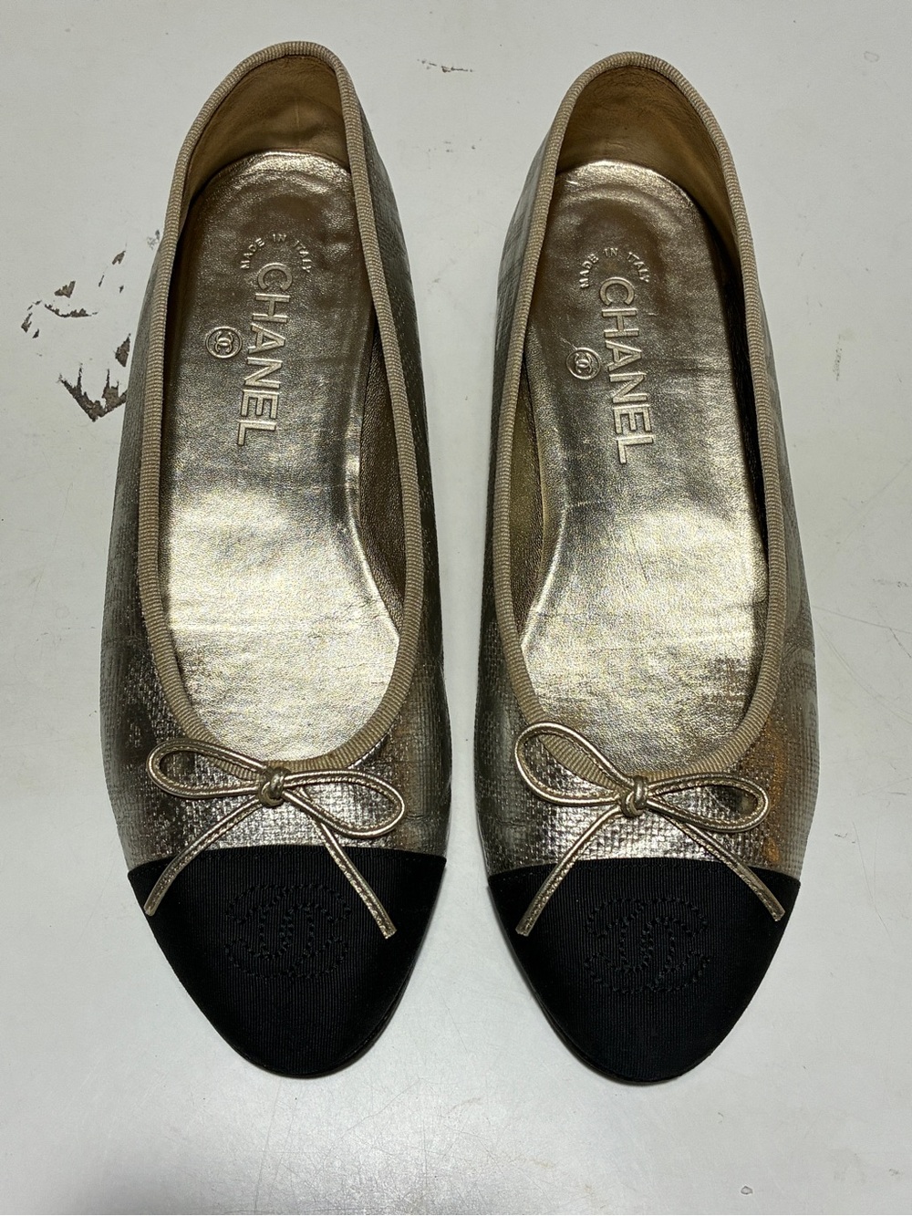 CHANEL Gold Metallic Leather Ballet Flats with Black Cap Toe